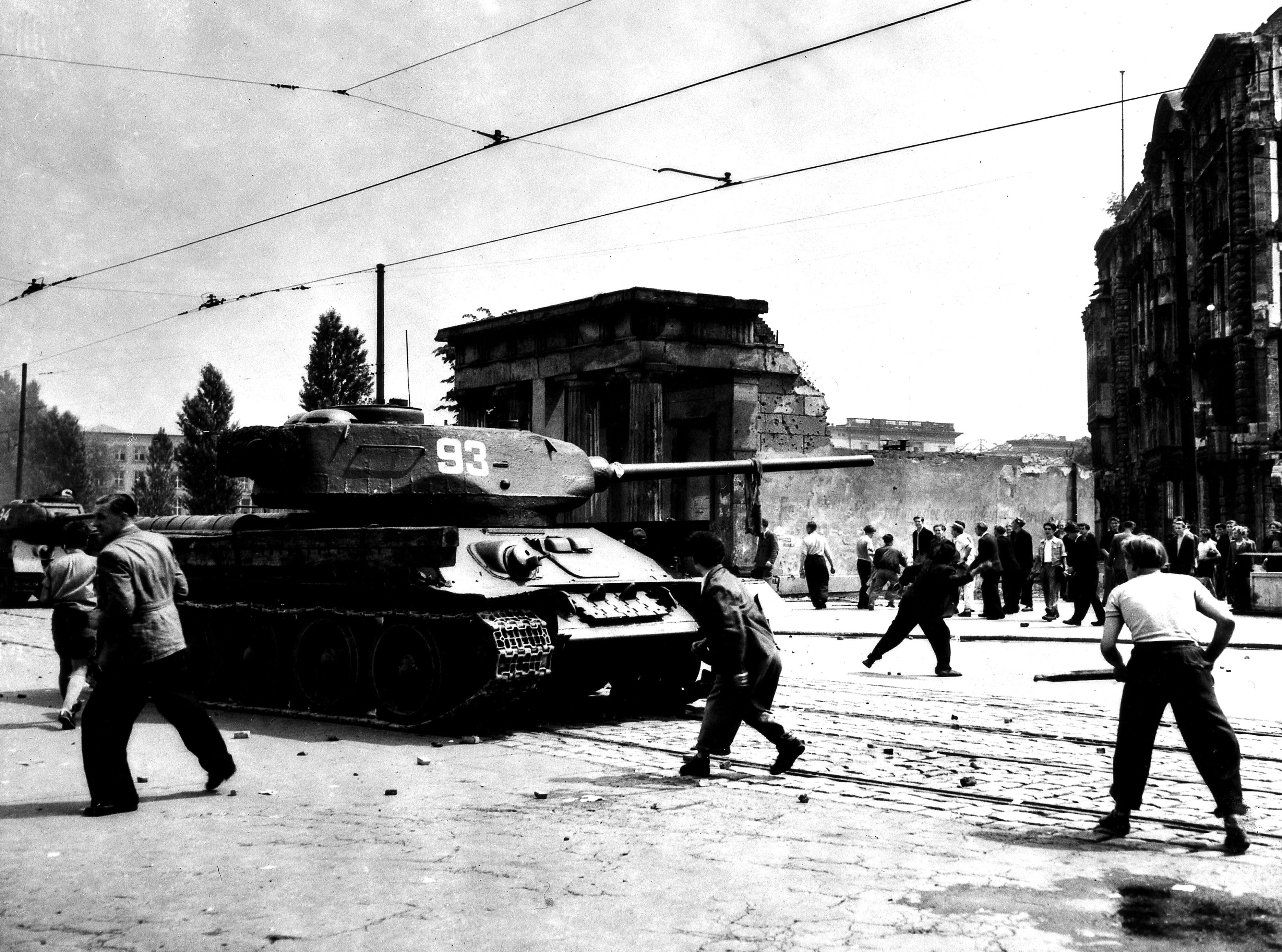 East Berlin: people throwing stones against Soviet tanks June 17, 1953 The German Democratic Republic (GDR) Washington. National archives